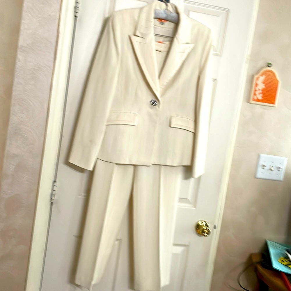 Beige pantsuit.